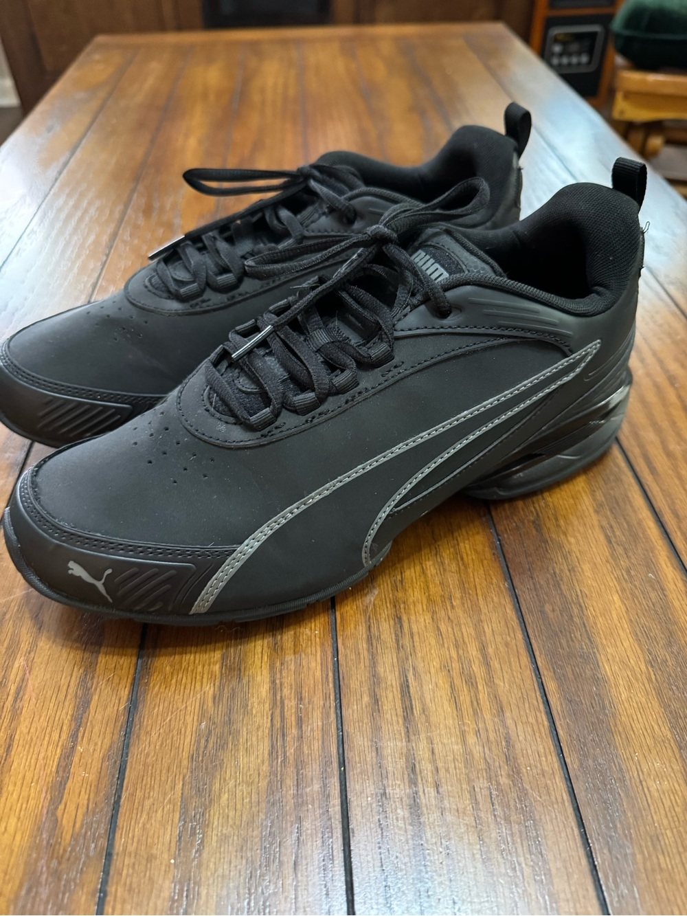 PUMA Black Athletic Trainers with Silver Accents